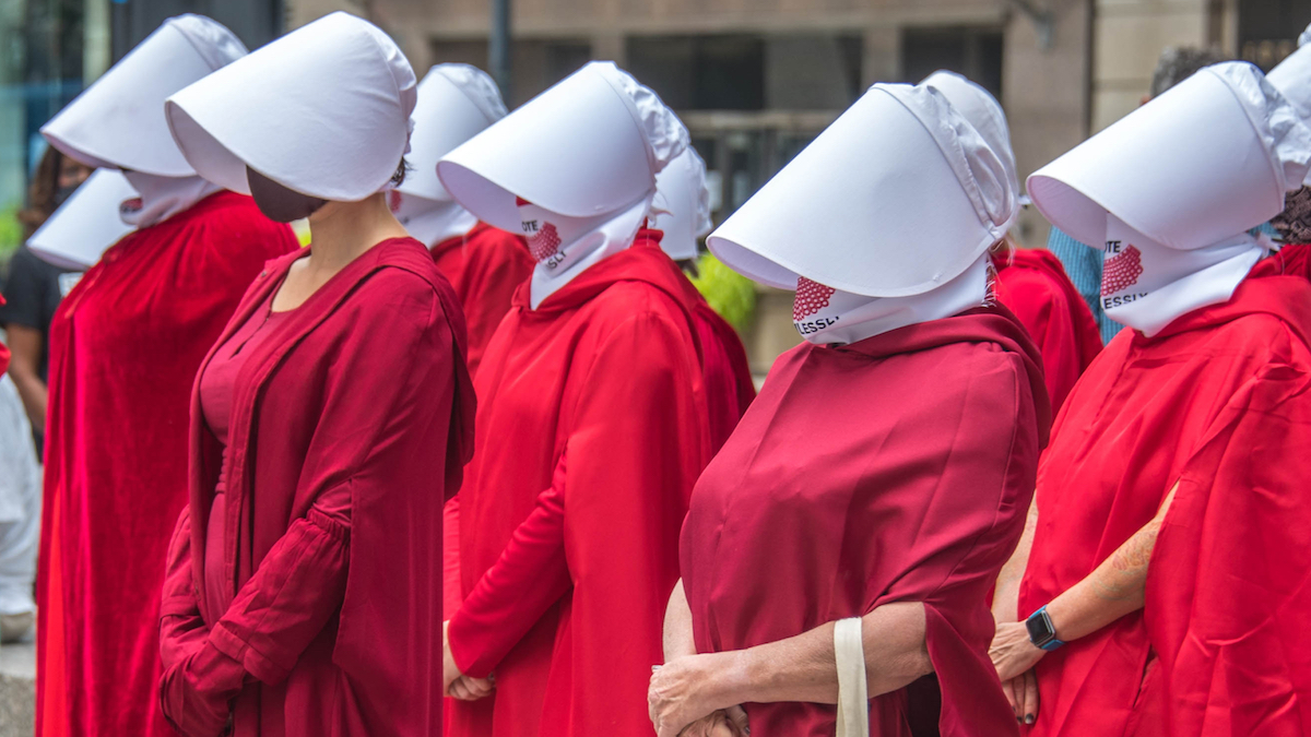 The secular defense of reproductive rights | WOmen in Handmaid's Tale outfits