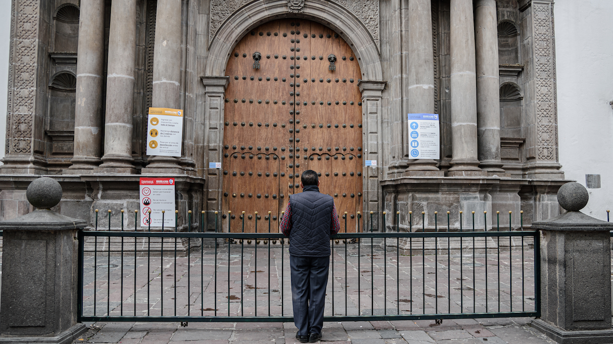 what do you miss and not miss about religion | man looks at locked church door