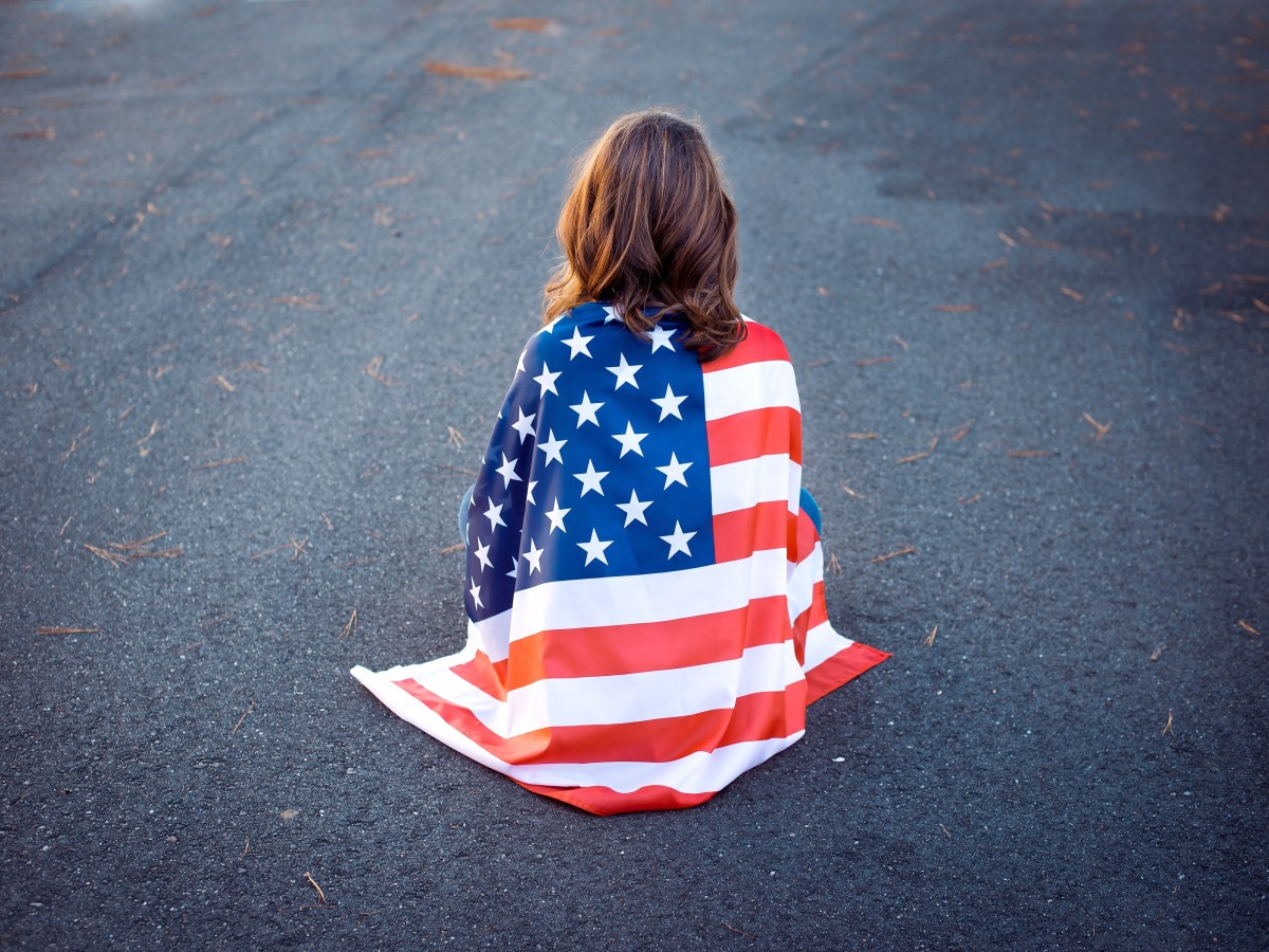 America, we need to talk | Girl wrapped in American flag