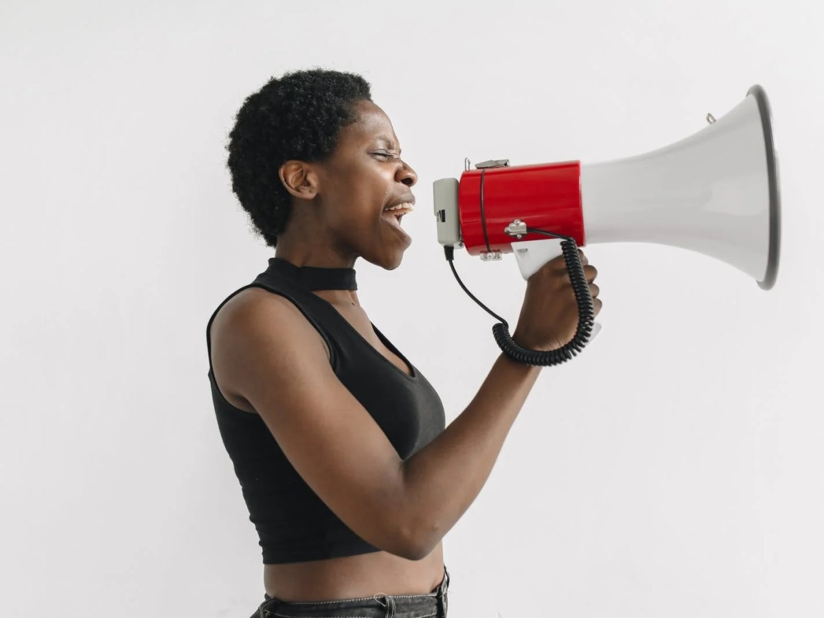 Dear Christians, Please stop using Jesus to spread hate | woman with megaphone