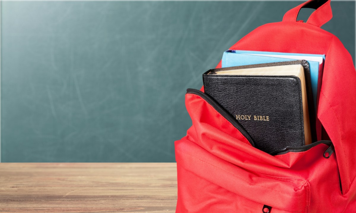 Maine's religious schools are choosing bigotry over taxpayer dollars | Red backpack with Bible
